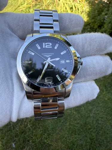 Longines conquest black dial - longines,