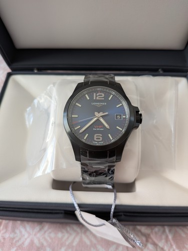 Longines conquest watch - longines, v.h.p.
